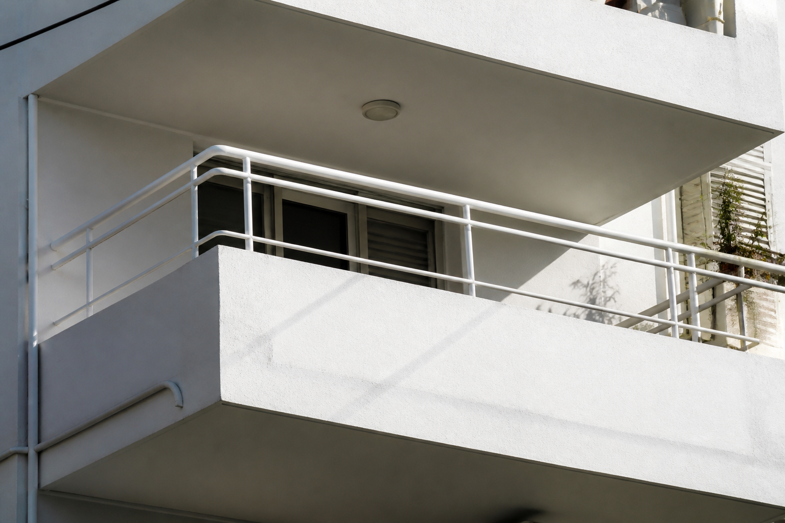White Bauhaus balcony railing detail